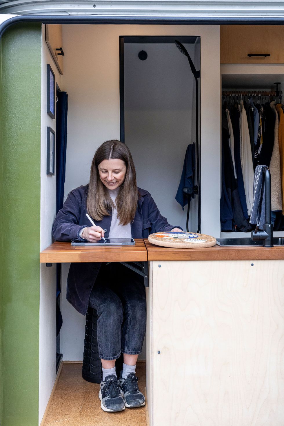 Amy working in her van studio. Image by Christina Davies, Fish2Photo