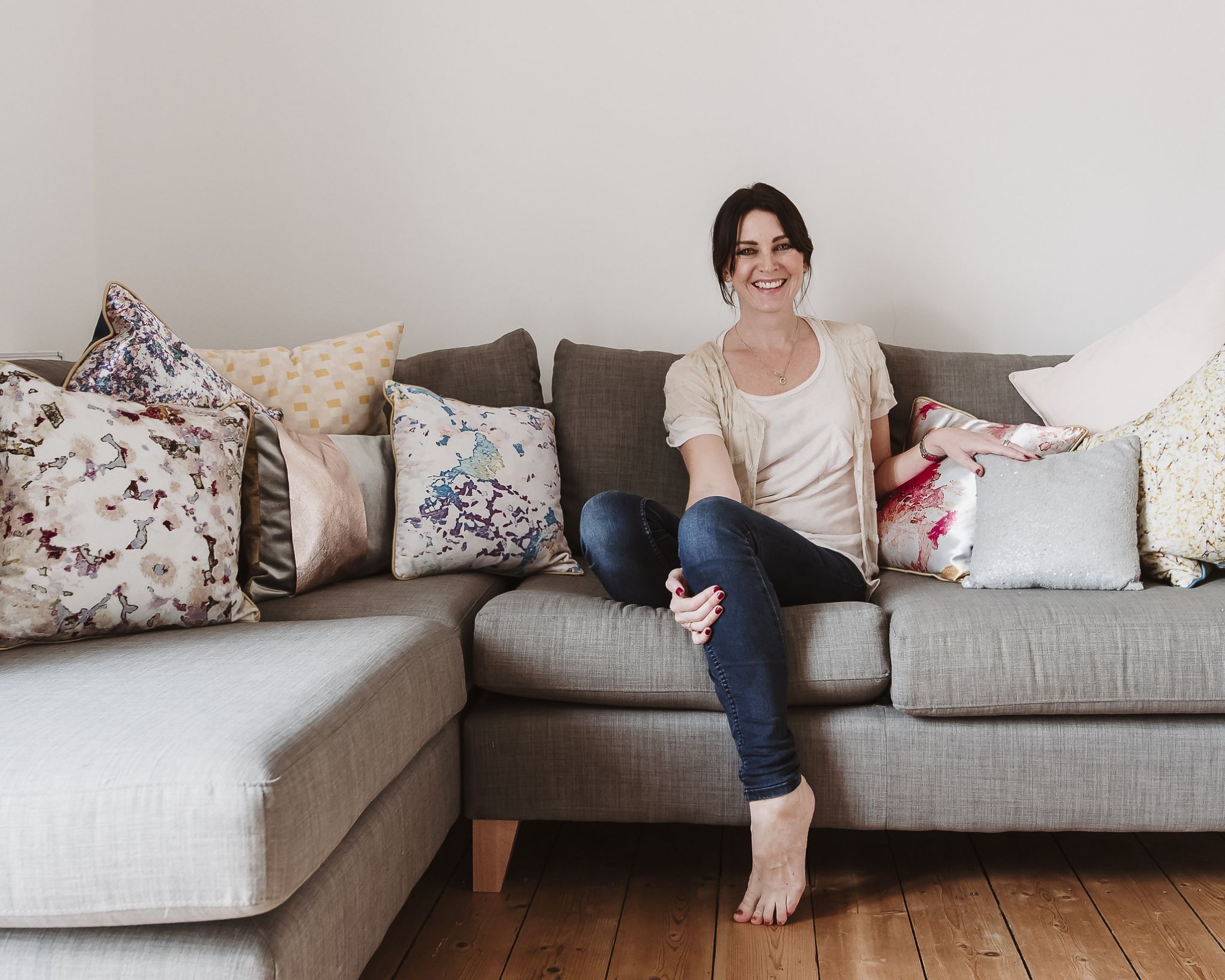 Claire Williams with some of her prints turned into cushion covers.