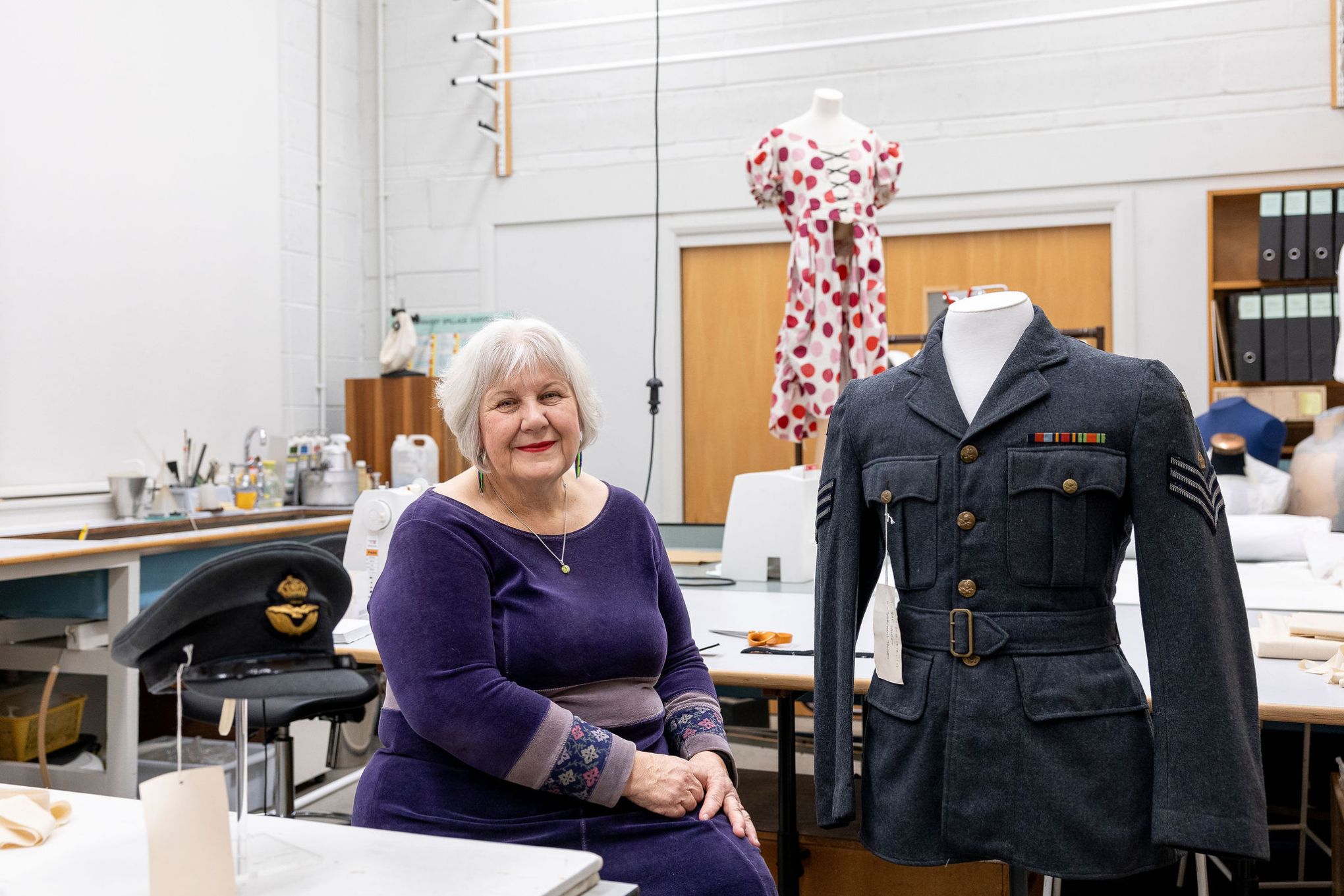 Julie Bell with artefacts at the Conservation Studio, Preston. Image by Christina Davies, Fish2Photo.